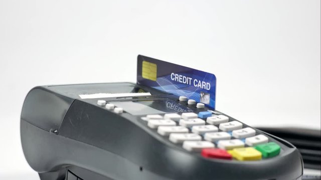 Stop motion Credit card reader machine or Payment terminal with credit card on table