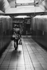 man walking in subway