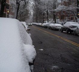 Snow Covering a Car In The Morning In Boston