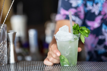 mohit cocktail, barman with colored t-shirt, summer