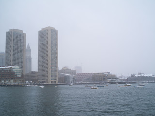Obraz premium Tall Buildings on Boston Waterfront in a Snow Storm