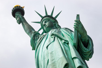 Fototapeta premium Looking Up at the Statue of Liberty in New York