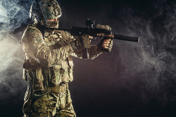 russian military man in special green uniform camouflage have strong and brave character to carry...
