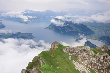 Swiss Alps and lakes at rainy day time. Luzern canton. Switzerland.