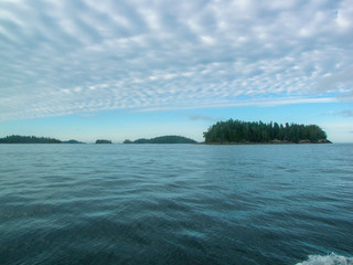 Fototapeta na wymiar Interesting Clouds over Islets