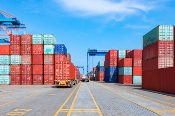 Containers on the wharf. International shipping logistics.