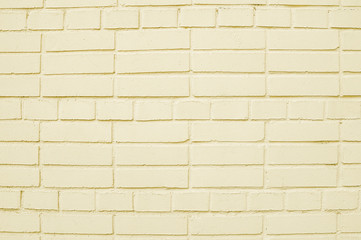 Old beige brick wall background