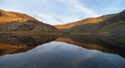 Fototapeta na wymiar Mountain lake reflection, Snowdonia national Park.