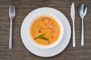 Thai soup Tom yam served outdoors