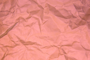 Crumpled pink paper.
