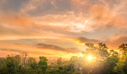 The house in the forest with a beautiful cloud in the morning.