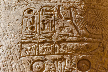Egyptian ancient hieroglyphs on the stone wall