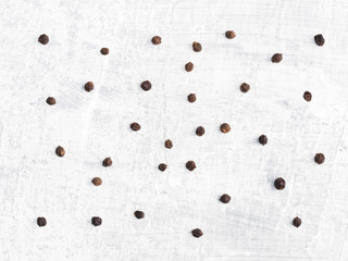 Black pepper peas on a white concrete background. Healthy eating concept