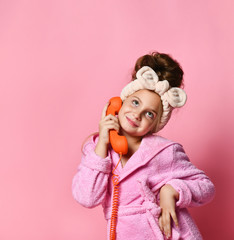 girl talking on a retro telephone