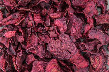Some Beetroot Chips (close-up shot; selective focus)