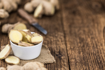 Portion of fresh Ginger (selective focus; close-up shot)