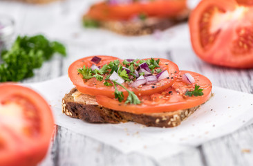 Some healthy Tomato Sandwich (selective focus; close-up shot)