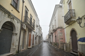 Fototapeta na wymiar Ancient Houses and Buildings in Troia, Foggia, Italy, at Morning with Foggy Weather