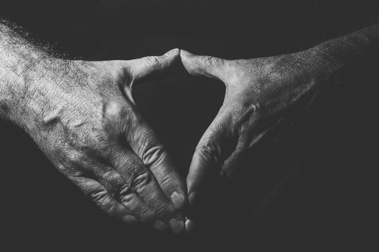 close-up of two hands showing the famous Merkel diamond