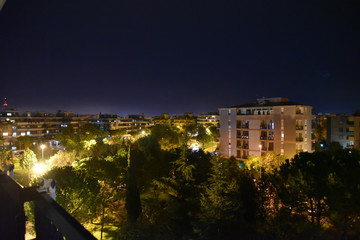 Obraz premium Night City View by Night Illuminated by Lamps