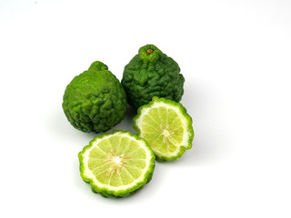 Kaffir lime and sliced, isolated on a white background, herbs, health.