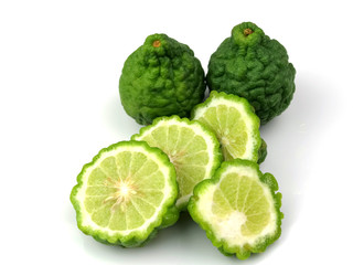 Fototapeta na wymiar Kaffir lime and sliced, isolated on a white background, herbs, health.