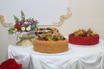 Beautiful, tall fruit cake in a restaurant