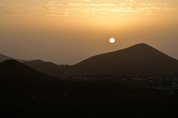 Sunrise in Lanzarote while the Calima wind is blowing.