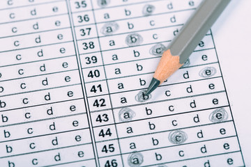 A pencil sitting on a test bubble sheet