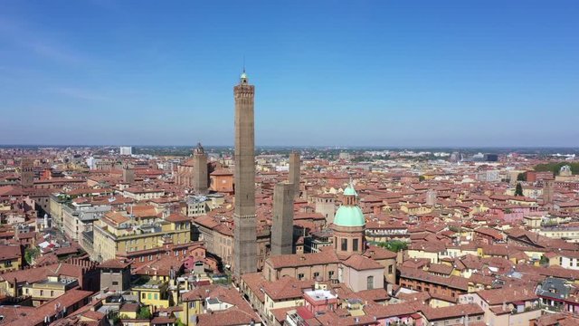 Two towers Bologna Italy aerial with Chiesa dei Santi Bartolomeo e Gaetano.