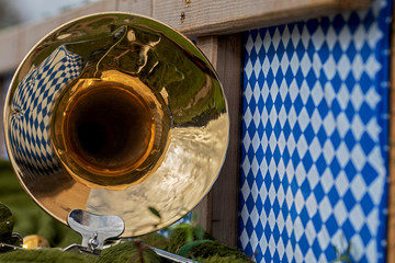 part of a tuba on the left bavarian diamond pattern on the right