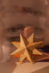 Christmas background with golden star. Merry christmas card. Winter holiday theme. Space for text....