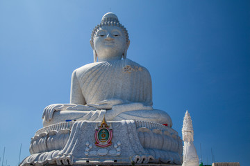 Fototapeta premium The buddha statue sits on top of the Nakkerd Hills between