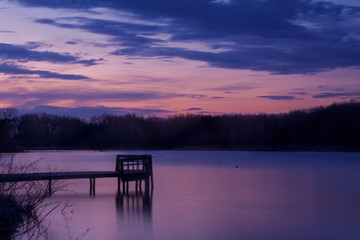 pier at sunset on the lake