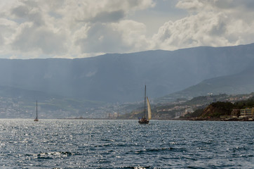sailing yacht and sea coast