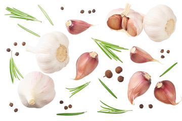 garlic with rosemary, peppercorns and allspice isolated on white background. top view