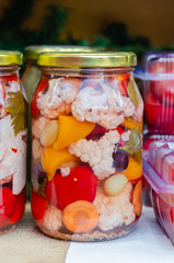 Homemade mixed pickles jars of marinated vegetables