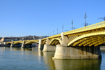 Fototapeta na wymiar Margaret Bridge, Danube bridge between Buda, the Margaret Island and Pest, sculpture at a bridge pillar by Adolphe Thabart, UNESCO World Heritage Site