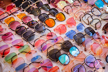 different choice of sunglasses at a street bazaar in Thailand