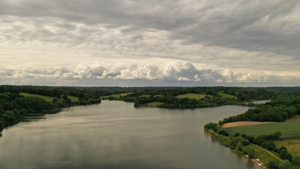 Fototapeta na wymiar Clouds over lake
