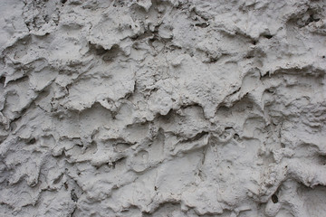 texture: white cement wall with swells
