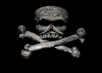 Skull and crossbones on a black background. Concept of death.
