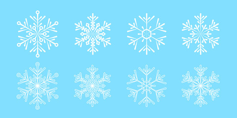 Fototapeta na wymiar Set of vector snowflakes isolated on blue background. Elements for design on Christmas