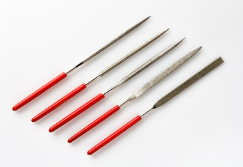 diamond file set with red handles on white background