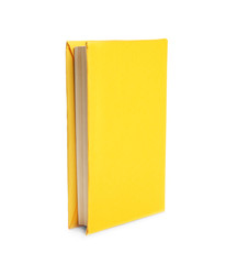 Book with blank yellow cover isolated on white