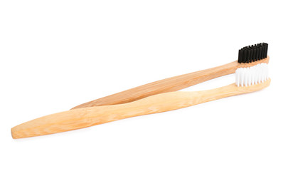 Natural bamboo toothbrushes with soft bristles isolated on white