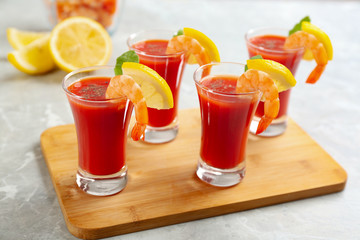 Delicious shrimp cocktail with tomato sauce served on  table