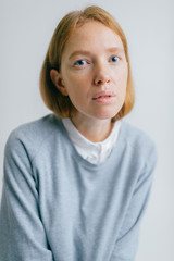 Beatiful freckles woman expressive portrait
