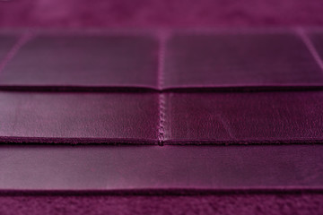 Purple handmade leather wallet details closeup