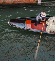 venetian gondola on river photographed from above with italian man on boat - 311239027
